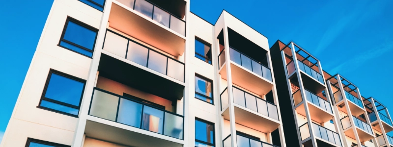 Commercial property under restoration with workers assessing damage